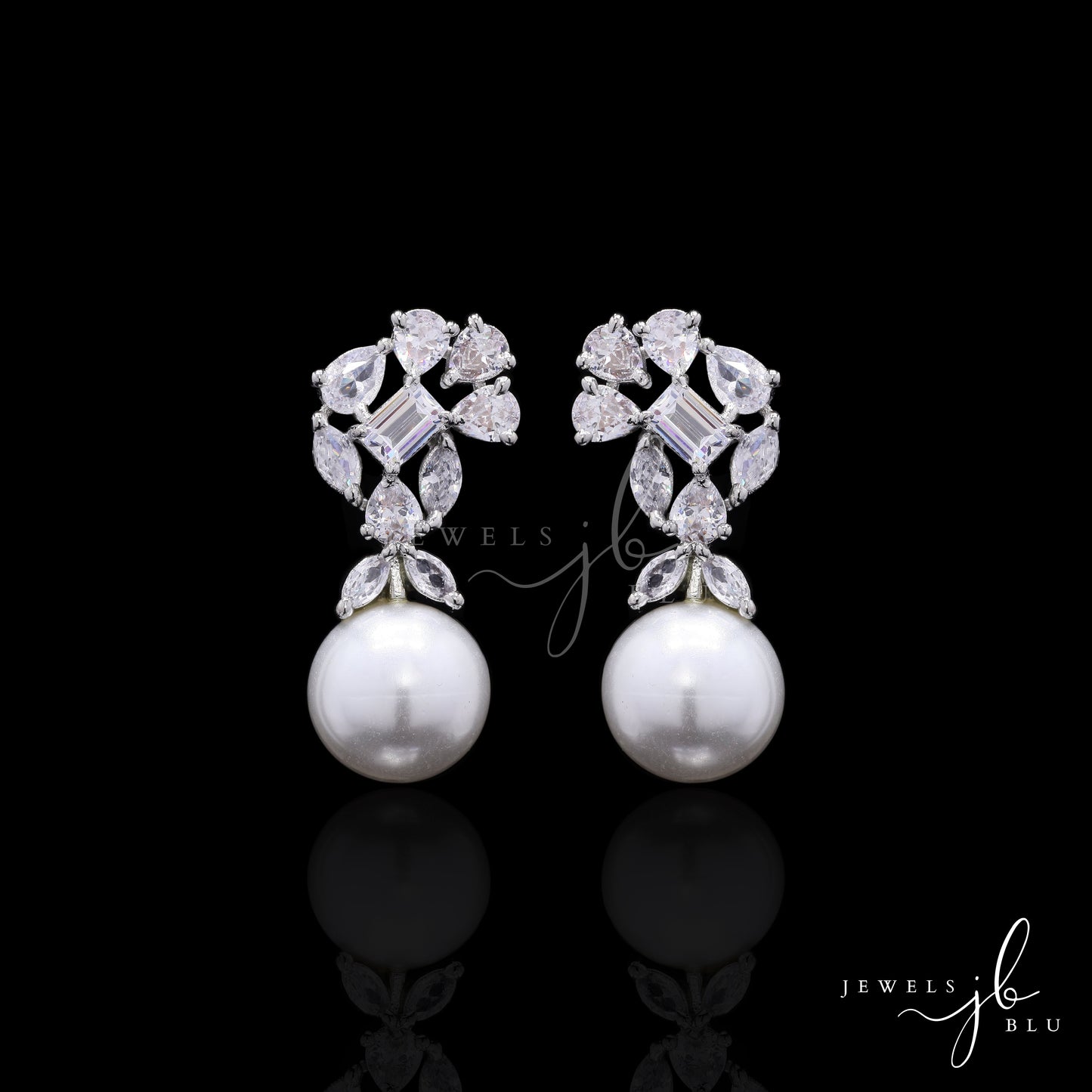 Fresh Water Pearl Studs With Multi Shape American Diamonds