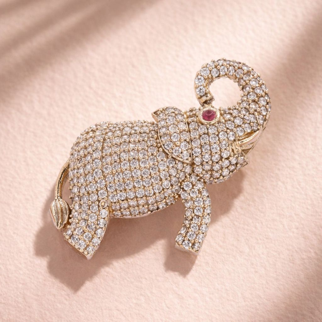 Antique Gold Finish Diamond Studded Shubh Elephant Unisex Brooch with Hydro Ruby Detailing