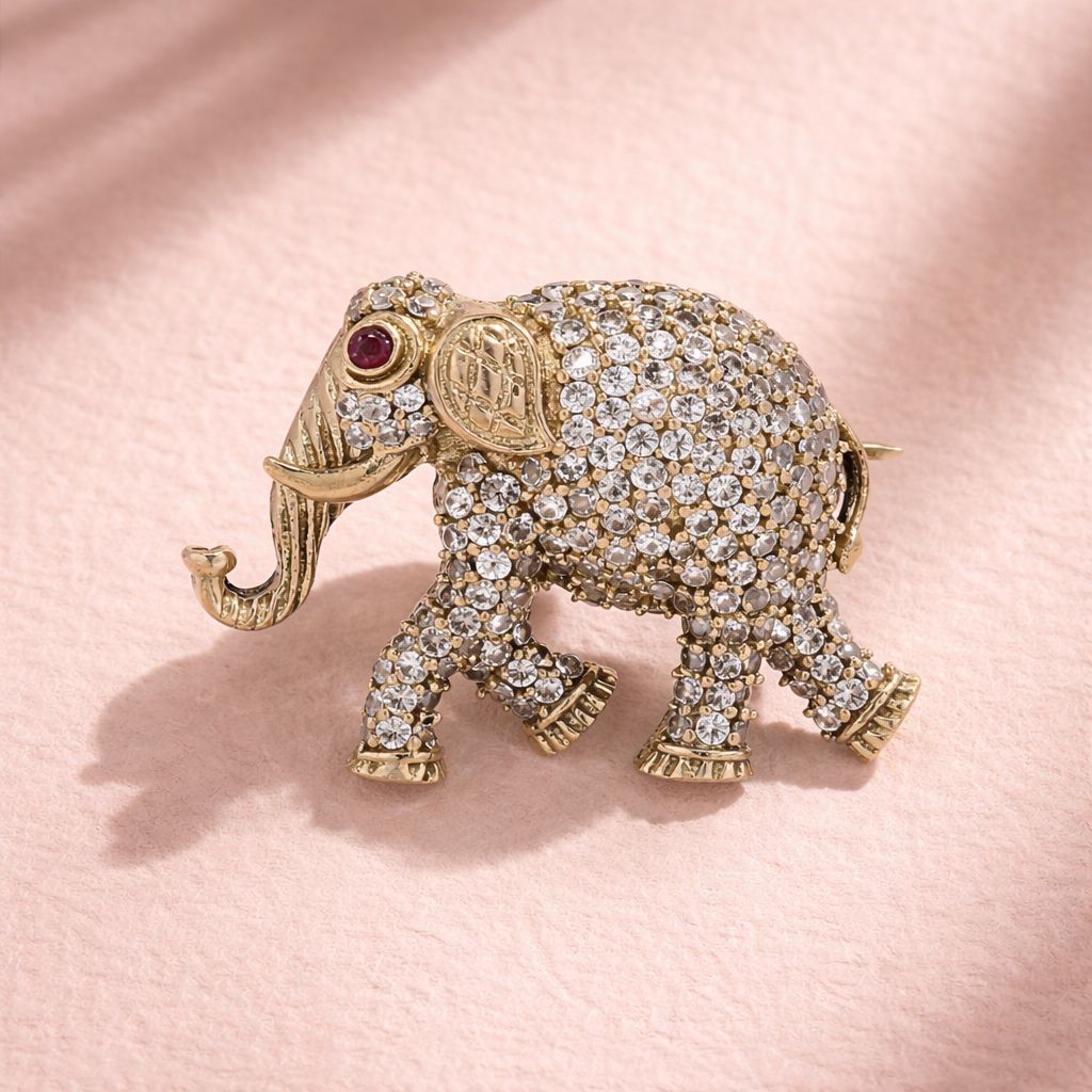 Antique Gold Finish Diamond Studded Elephant Unisex Brooch with Ruby Detailing